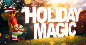 Holiday Magic glowing sign with a gingerbread man standing next to it.