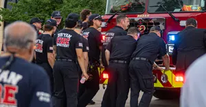 Bryan firefighters conducting the "Push-In" Ceremony for the new fire truck