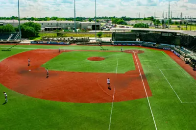 Travis Major Field aerial view of baseball diamond and stands with players on the field