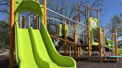 Dual slide at new Copperfield Park playground.
