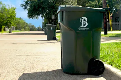City of Bryan garbage bin sitting at the curb