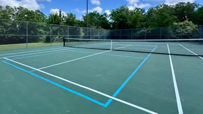 Copperfield Park improved tennis court 