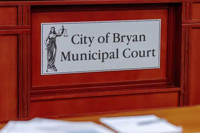 front of the docket podium in the courtroom