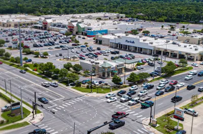 aerial view of the Tejas Center shopping center street intersection of Texas Ave. and Villa Maria
