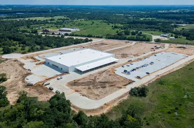 Aerial image of a facility under construction.