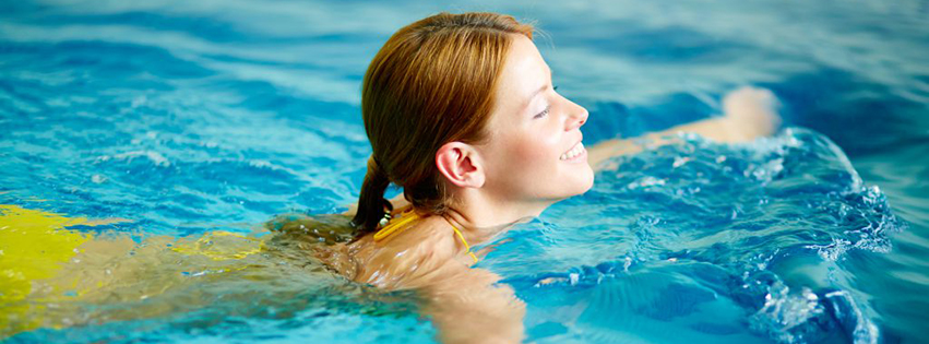 woman swimming to stay cool