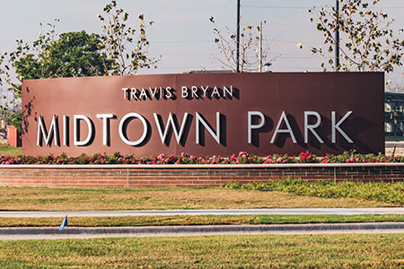 Intro signage at Travis Bryan Midtown Park