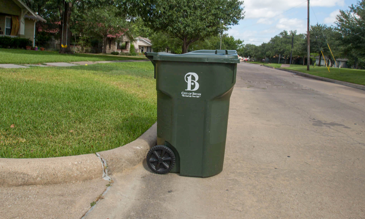 City of Bryan trash container on street