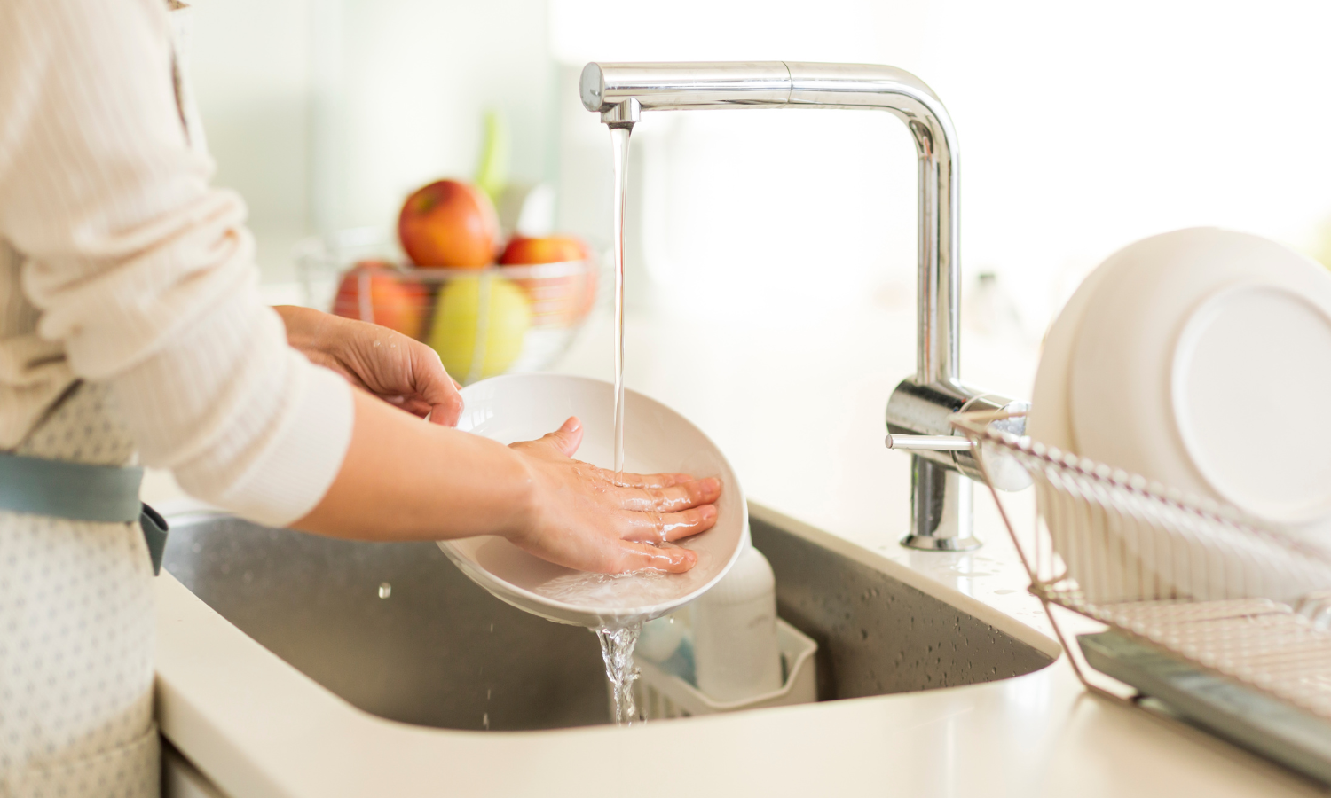 Person washing dishes