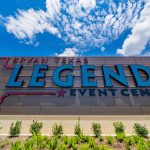 Exterior view of the Legends Event Center and its logo signage.