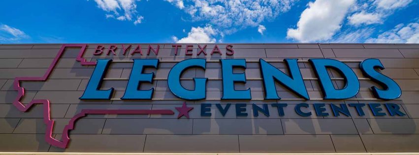 Exterior view of the Legends Event Center and its logo signage.
