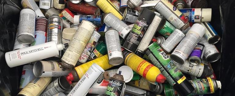 Image showing hazardous chemical cans that are being disposed of.