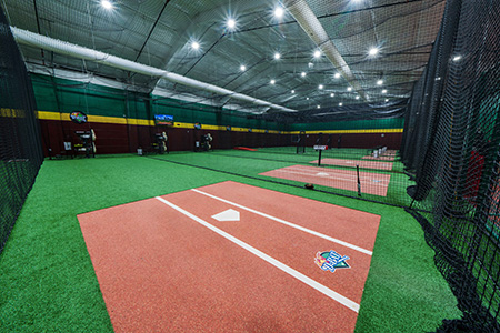 Interior of D-BAT indoor batting cages and baseball and softball training facility.