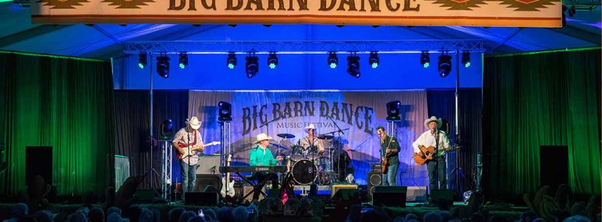 A band plays on stage at the Big Barn Dance.