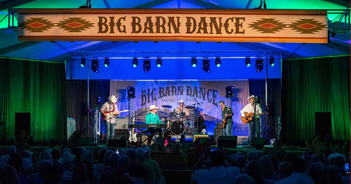 A band plays on stage at the Big Barn Dance.