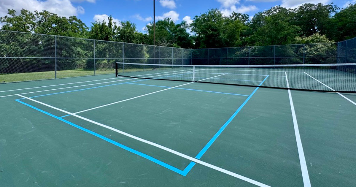Copperfield Park improved tennis court
