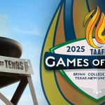 Games of Texas tower with lit torch burning bright