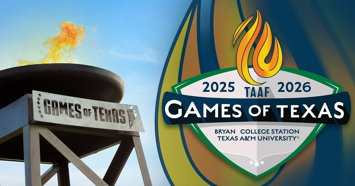 Games of Texas tower with lit torch burning bright