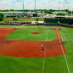 Travis Major Field aerial view of baseball diamond and stands with players on the field