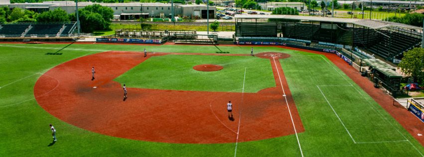 Travis Major Field aerial view of baseball diamond and stands with players on the field